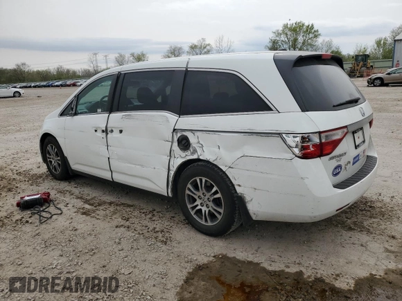 2012 Honda Odyssey EX-L with VIN 5FNRL5H65CB146467, listed as a Copart auction lot 53268135 with 112,340 mi miles and Salvage Title. Bid and sale history available at DreamBid. Image 2.