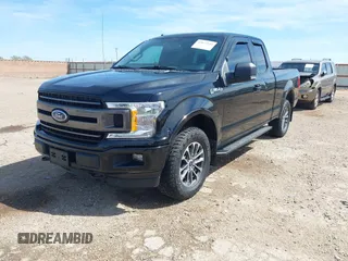 2018 Ford F-150 XL with VIN 1FTEX1EP7JFC21008, listed as a IAAI auction lot 42072145 with 102,679 mi miles and . Bid and sale history available at DreamBid. Image 17.