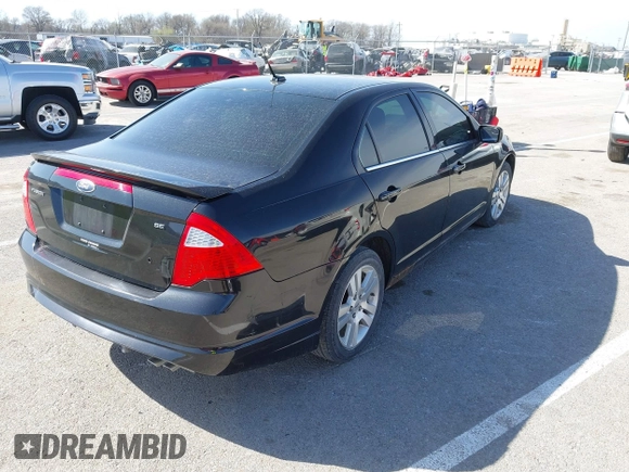 2011 Ford Fusion SE with VIN 3FAHP0HA8BR232236, listed as a IAAI auction lot 41819322 with 196,339 mi miles. Bid and sale history available at carsss.com. Image 4.