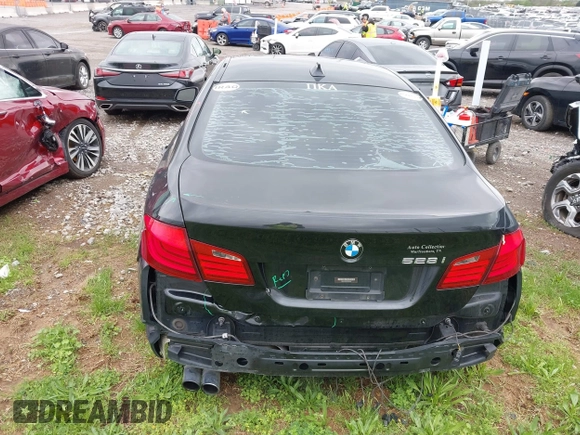 2012 BMW 5 Series 528i with VIN WBAXG5C5XCDX01864, listed as a IAAI auction lot 41910337 with 200,110 mi miles. Bid and sale history available at carsss.com. Image 6.