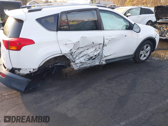 2014 Toyota RAV4 XLE with VIN 2T3RFREV1EW202699, listed as a IAAI auction lot 41117670 with 141,560 mi miles and . Bid and sale history available at DreamBid. Image 13.