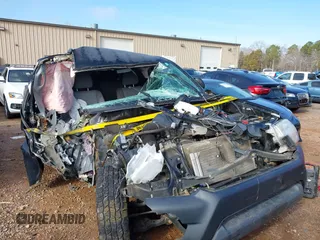 2015 Toyota Tacoma with VIN 3TMLU4EN8FM195249, listed as a IAAI auction lot 41416129 with 129,544 mi miles. Bid and sale history available at carsss.com. Image 6.