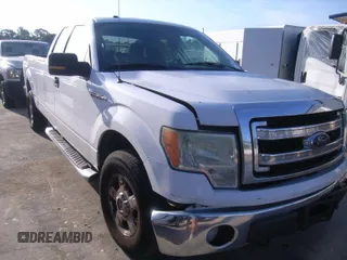 2014 Ford F-150 XL with VIN 1FTFX1EF2EKE57980, listed as a IAAI auction lot 42197614 with 283,114 mi miles. Bid and sale history available at carsss.com. Image 1.