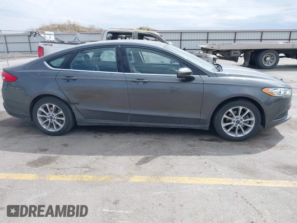 2017 Ford Fusion SE with VIN 3FA6P0H7XHR228922, listed as a IAAI auction lot 42162345 with 186,000 mi miles and . Bid and sale history available at DreamBid. Image 13.