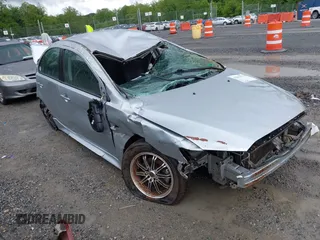 2011 Mitsubishi Lancer ES z VIN JA32U2FU5BU002209, wystawiony jako IAAI lot #42232973 z przebiegiem 167 227 mil mil oraz . Historia ofert i sprzedaży dostępna na DreamBid. Obrazek 1.