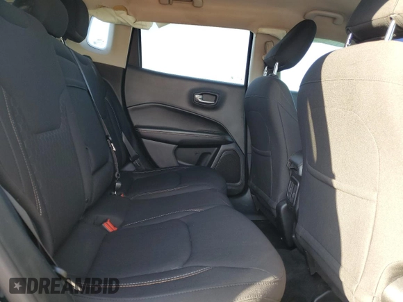 2018 Jeep Compass Sport z VIN 3C4NJCABXJT106979, wystawiony jako Copart lot #62165865 z przebiegiem Nie podano mil oraz Szkoda całkowita • Salvage title. Historia ofert i sprzedaży dostępna na DreamBid. Obrazek 11.