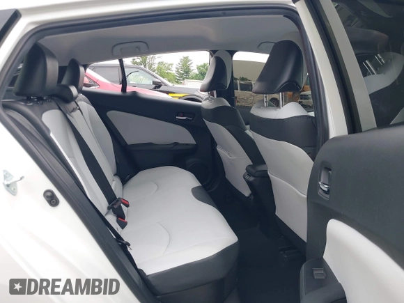 2021 Toyota Prius L Eco with VIN JTDKAMFU6M3137679, listed as a IAAI auction lot 42488129 with 52,414 mi miles and . Bid and sale history available at DreamBid. Image 8.