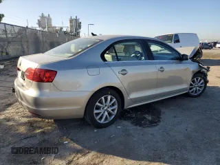 2014 Volkswagen Jetta SE with VIN 3VWD17AJ2EM240795, listed as a Copart auction lot 49749455 with 73,389 mi miles and Salvage title. Bid and sale history available at DreamBid. Image 3.