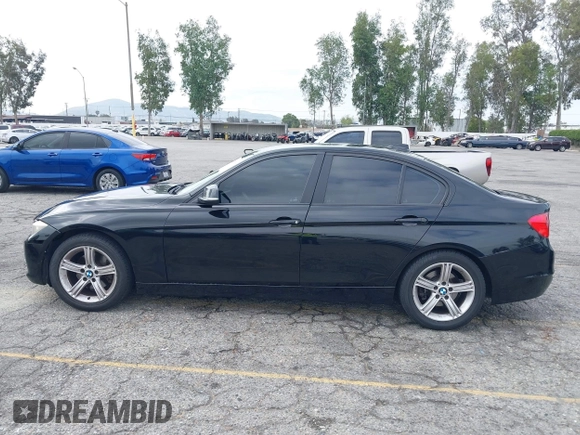 2014 BMW 3 Series 320i with VIN WBA3B1G57ENS80800, listed as a IAAI auction lot 42097683 with 152,924 mi miles. Bid and sale history available at carsss.com. Image 14.
