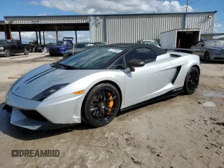 2013 Lamborghini Gallardo z VIN ZHWGU8AJ7DLA12671, wystawiony jako Copart lot #75721804 z przebiegiem 14 849 mil mil oraz Nie do naprawy. Historia ofert i sprzedaży dostępna na DreamBid. Obrazek 1.