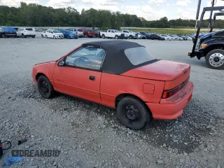 1992 Geo Metro z VIN JG1MR3369NK219164, wystawiony jako Copart lot #69017534 z przebiegiem 76 098 mil mil oraz Szkody całkowita. Historia ofert i sprzedaży dostępna na DreamBid. Obrazek 2.