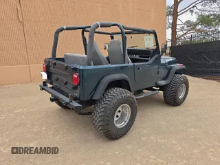 1995 Jeep Wrangler S with VIN 1J4FY19PXSP218282, listed as a Copart auction lot 63527435 with 160,957 mi miles and Clean title. Bid and sale history available at DreamBid. Image 4.