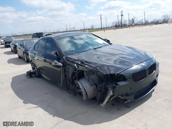 2013 BMW M5 with VIN WBSFV9C54DD095547, listed as a IAAI auction lot 41601733 with 1 mi miles. Bid and sale history available at carsss.com. Image 1.
