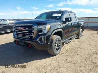 2021 GMC Sierra 1500 AT4 with VIN 1GTU9EETXMZ230606, listed as a IAAI auction lot 41599778 with 128,745 mi miles. Bid and sale history available at carsss.com. Image 6.