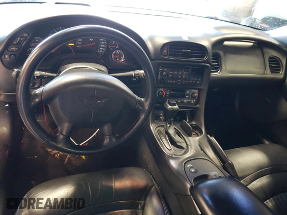 2002 Chevrolet Corvette with VIN 1G1YY22G825115140, listed as a Copart auction lot 79898774 with 64,214 mi miles and Salvage Title. Bid and sale history available at carsss.com. Image 8.