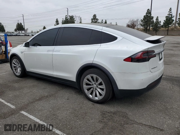 2016 Tesla Model X 70D z VIN 5YJXCAE2XGF003344, wystawiony jako Copart lot #53123305 z przebiegiem 126 052 mil mil oraz Szkody całkowita. Historia ofert i sprzedaży dostępna na DreamBid. Obrazek 2.