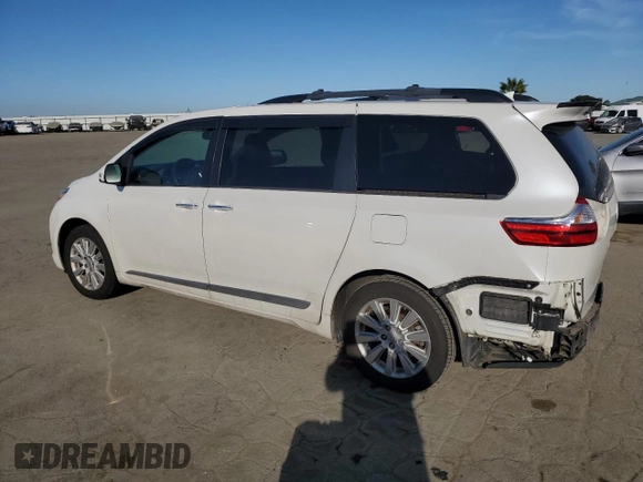 2015 Toyota Sienna Limited with VIN 5TDDK3DC2FS099332, listed as a Copart auction lot 47571435 with 107,449 mi miles and Salvage Title. Bid and sale history available at DreamBid. Image 2.