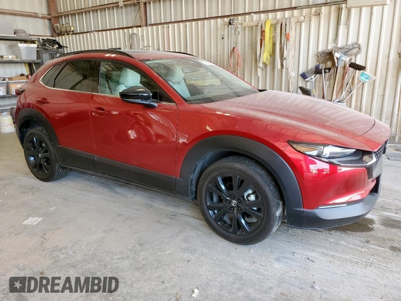 2025 Mazda CX-30 Premium with VIN 3MVDMBDY1SM801827, listed as a Copart auction lot 61619945 with 2,936 mi miles and Salvage title. Bid and sale history available at DreamBid. Image 4.