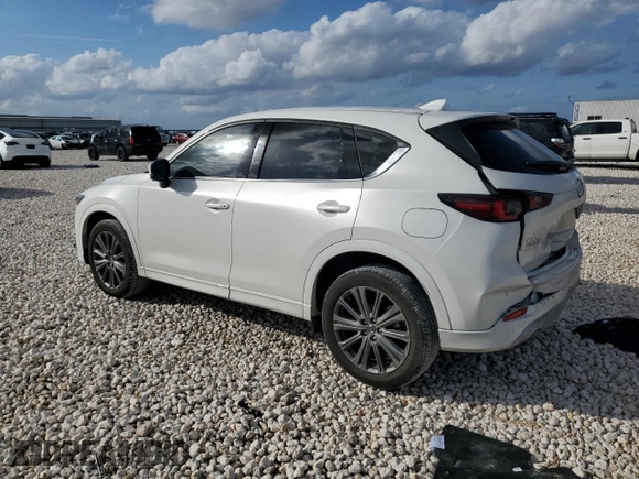 2024 Mazda CX-5 2.5 Turbo Signature with VIN JM3KFBXY7R0518304, listed as a Copart auction lot 42788985 with 8,593 mi miles and Salvage Title. Bid and sale history available at carsss.com. Image 2.