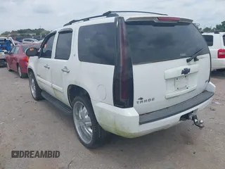 2009 Chevrolet Tahoe 2LT z VIN 1GNFC23059R156494, wystawiony jako IAAI lot #42423722 z przebiegiem Nie podano mil oraz . Historia ofert i sprzedaży dostępna na DreamBid. Obrazek 3.