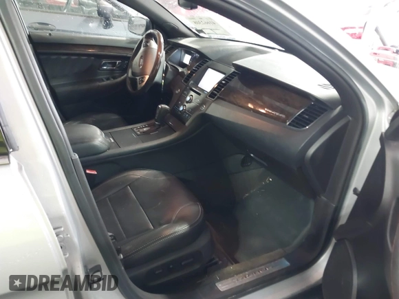 2014 Ford Taurus Limited with VIN 1FAHP2F81EG101351, listed as a IAAI auction lot 41662308 with 139,542 mi miles. Bid and sale history available at carsss.com. Image 5.