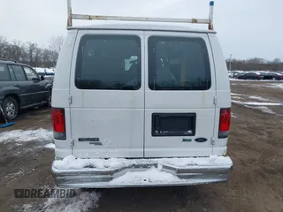2011 Ford Econoline Cargo Commercial with VIN 1FTNE1EWXBDA35585, listed as a IAAI auction lot 41349320 with 122,311 mi miles and . Bid and sale history available at carsss.com. Image 16.