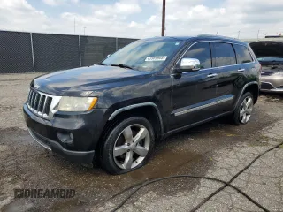 2011 Jeep Grand Cherokee Limited with VIN 1J4RR5GT4BC619724, listed as a Copart auction lot 63989905 with 212,198 mi miles and Clean title. Bid and sale history available at DreamBid. Image 1.