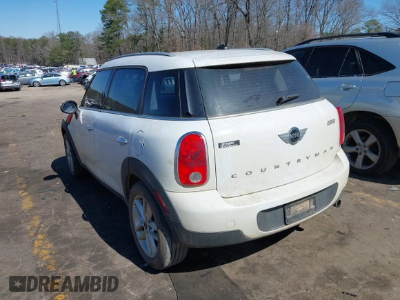 2014 MINI Countryman with VIN WMWZB3C52EWR42241, listed as a IAAI auction lot 41734963 with 121,325 mi miles and . Bid and sale history available at DreamBid. Image 3.