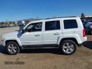 2011 Jeep Patriot Latitude with VIN 1J4NT1GB0BD105816, listed as a IAAI auction lot 41330180 with 143,431 mi miles. Bid and sale history available at carsss.com. Image 14.
