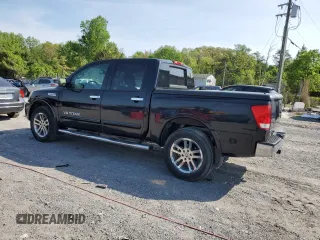 2012 Nissan Titan SV with VIN 1N6AA0EC3CN305453, listed as a Copart auction lot 55477425 with 79,501 mi miles and Salvage Title. Bid and sale history available at carsss.com. Image 2.