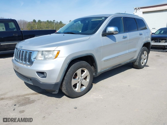 2011 Jeep Grand Cherokee Limited with VIN 1J4RR5GG8BC556064, listed as a IAAI auction lot 42014688 with 151,706 mi miles. Bid and sale history available at carsss.com. Image 2.