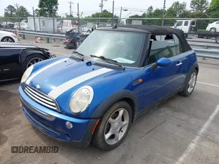 2006 MINI Convertible with VIN WMWRF33566TF65679, listed as a IAAI auction lot 42288864 with 119,884 mi miles and . Bid and sale history available at DreamBid. Image 2.