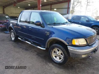 2002 Ford F-150 XLT with VIN 1FTRW086X2KE17566, listed as a IAAI auction lot 41721236 with 98,524 mi miles. Bid and sale history available at carsss.com. Image 1.