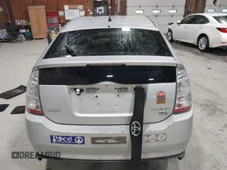 2007 Toyota Prius z VIN JTDKB20U977649489, wystawiony jako IAAI lot #41772600 z przebiegiem 248 525 mil mil oraz . Historia ofert i sprzedaży dostępna na DreamBid. Obrazek 16.