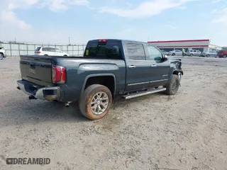 2018 GMC Sierra 1500 SLT with VIN 3GTU2NEC8JG325990, listed as a IAAI auction lot 42066315 with 119,327 mi miles. Bid and sale history available at carsss.com. Image 4.