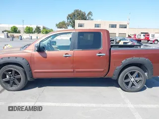 2004 Nissan Titan LE z VIN 1N6AA07A84N514538, wystawiony jako IAAI lot #42396385 z przebiegiem 214 783 mil mil oraz . Historia ofert i sprzedaży dostępna na DreamBid. Obrazek 14.