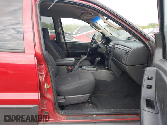 2004 Jeep Grand Cherokee Laredo with VIN 1J4GW48S64C371253, listed as a IAAI auction lot 42099607 with 260,618 mi miles. Bid and sale history available at carsss.com. Image 5.