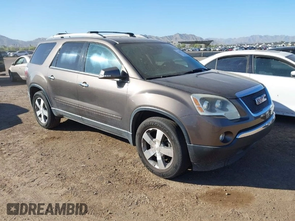 2012 GMC Acadia SLT2 with VIN 1GKKRSED0CJ190603, listed as a IAAI auction lot 42045225 with 153,601 mi miles. Bid and sale history available at carsss.com. Image 1.