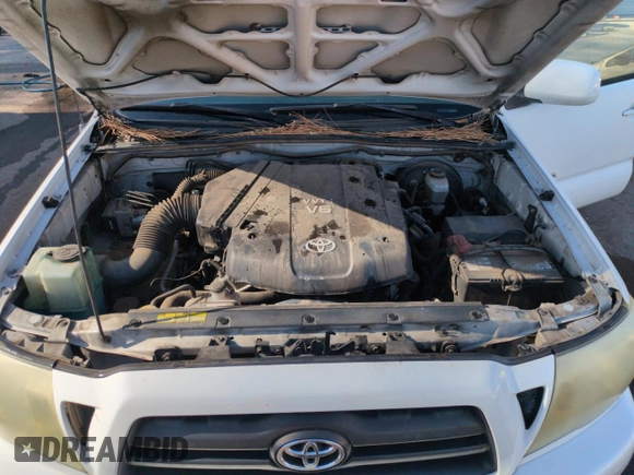 2006 Toyota Tacoma z VIN 5TEMU52N76Z249187, wystawiony jako Copart lot #53511195 z przebiegiem 247 808 mil mil oraz Szkoda całkowita • Salvage title. Historia ofert i sprzedaży dostępna na DreamBid. Obrazek 11.