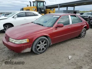 2002 Cadillac Seville Touring STS z VIN 1G6KY54902U132357, wystawiony jako Copart lot #42008795 z przebiegiem 111 014 mil mil oraz Szkody całkowita. Historia ofert i sprzedaży dostępna na DreamBid. Obrazek 1.