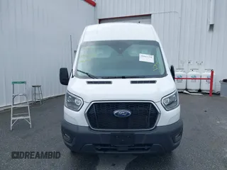 2023 Ford Transit Cargo with VIN 1FTBW3XG1PKB89459, listed as a IAAI auction lot 39961794 with 6,756 mi miles and . Bid and sale history available at carsss.com. Image 12.