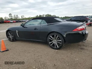 2007 Jaguar XK XKR with VIN SAJWA44C879B19251, listed as a Copart auction lot 50807595 with 100,715 mi miles and Salvage Title. Bid and sale history available at DreamBid. Image 2.