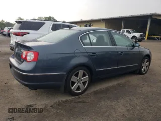 2009 Volkswagen Passat Komfort z VIN WVWJK73CX9P055380, wystawiony jako Copart lot #65812774 z przebiegiem 170 237 mil mil oraz Tytuł czysty. Historia ofert i sprzedaży dostępna na DreamBid. Obrazek 3.