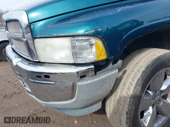 1998 Dodge 1500 z VIN 1B7HF13Y4WJ203422, wystawiony jako IAAI lot #41589831 z przebiegiem 454 838 mil mil oraz . Historia ofert i sprzedaży dostępna na DreamBid. Obrazek 13.