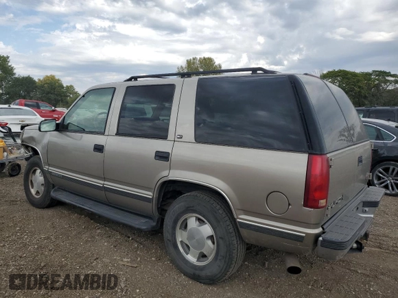 1999 GMC Yukon with VIN 1GKEK13R9XJ787877, listed as a Copart auction lot 72185044 with 191,710 mi miles and Salvage Title. Bid and sale history available at carsss.com. Image 2.