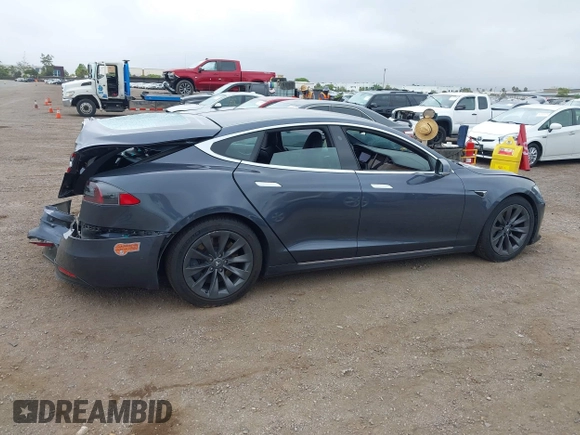 2020 Tesla Model S Long Range with VIN 5YJSA1E29LF363957, listed as a IAAI auction lot 42402667 with 45,058 mi miles and . Bid and sale history available at DreamBid. Image 13.