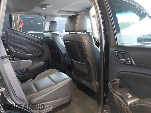 2015 Chevrolet Tahoe LT with VIN 1GNSKBKCXFR604401, listed as a IAAI auction lot 42048559 with 60,768 mi miles and . Bid and sale history available at DreamBid. Image 8.