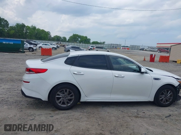 2020 Kia Optima LX with VIN 5XXGT4L3XLG385606, listed as a IAAI auction lot 42307975 with 164,000 mi miles and . Bid and sale history available at DreamBid. Image 14.