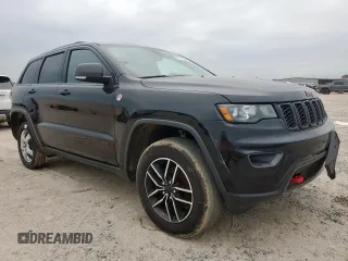 2019 Jeep Grand Cherokee Trailhawk with VIN 1C4RJFLG8KC613582, listed as a Copart auction lot 62901405 with 136,809 mi miles and Salvage title. Bid and sale history available at DreamBid. Image 4.
