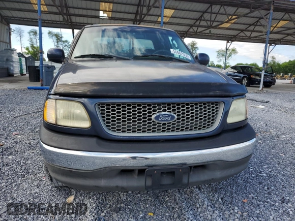 2002 Ford F-150 XL with VIN 1FTRX17232NB20820, listed as a Copart auction lot 55062355 with 231,726 mi miles and Salvage title. Bid and sale history available at DreamBid. Image 5.